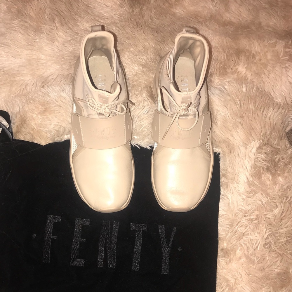 Beige high top Fenty shoes